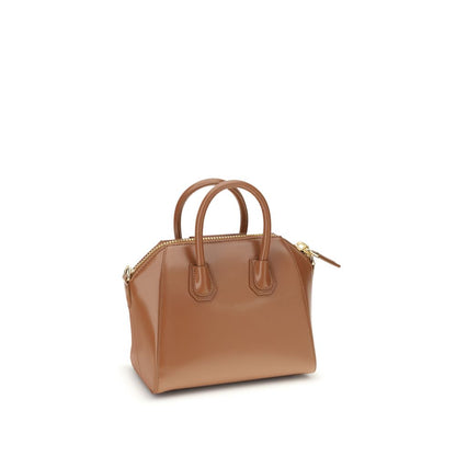 Givenchy Brown Calf Leather Bos Taurus Handbag with geometric design, top handles, and adjustable shoulder strap.