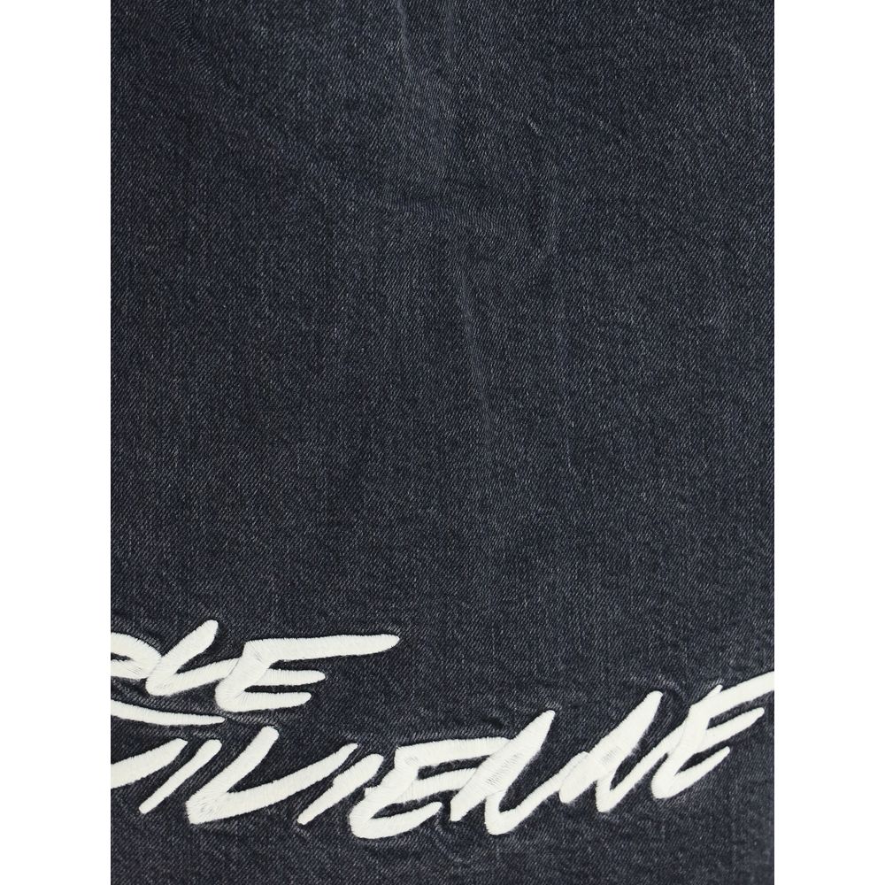 Close-up of Kenzo Black Denim Shirt with Futura 2000 Boke Flower embroidery, showcasing Japanese stone bleach wash design.