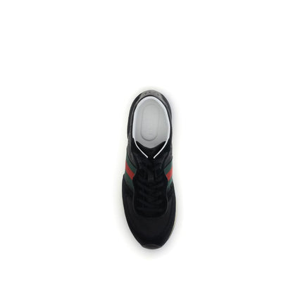 Top view of Gucci Black Polyamide Athletic Sneakers with green and red Web stripe and GG logo on rubber sole.