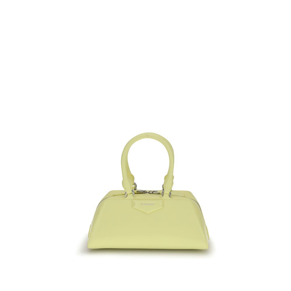 Givenchy Yellow Calf Leather Bos Taurus Handbag with elegant design and articulated handles.