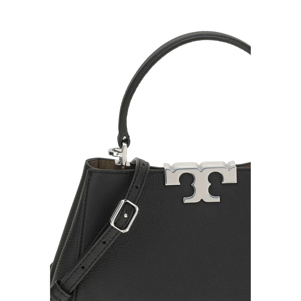 Tory Burch Black Calf Leather Bos Taurus Handbag featuring a close-up of the leather top handle and adjustable shoulder strap.