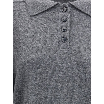 Close-up of Loulou De Saison Gray Cashmere Cashmere Sweater with ribbed collar and button closure, showcasing elegance and comfort.