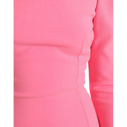 Close-up of Dolce & Gabbana Pink Polyester Long Sleeves Sheath Midi Dress showcasing the smooth, luxurious fabric and sleek design.