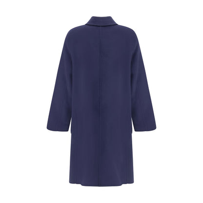 Back view of Tory Burch Blue Wool Coat with reversible design and T Monogram pattern, featuring an oversize fit for AW25.