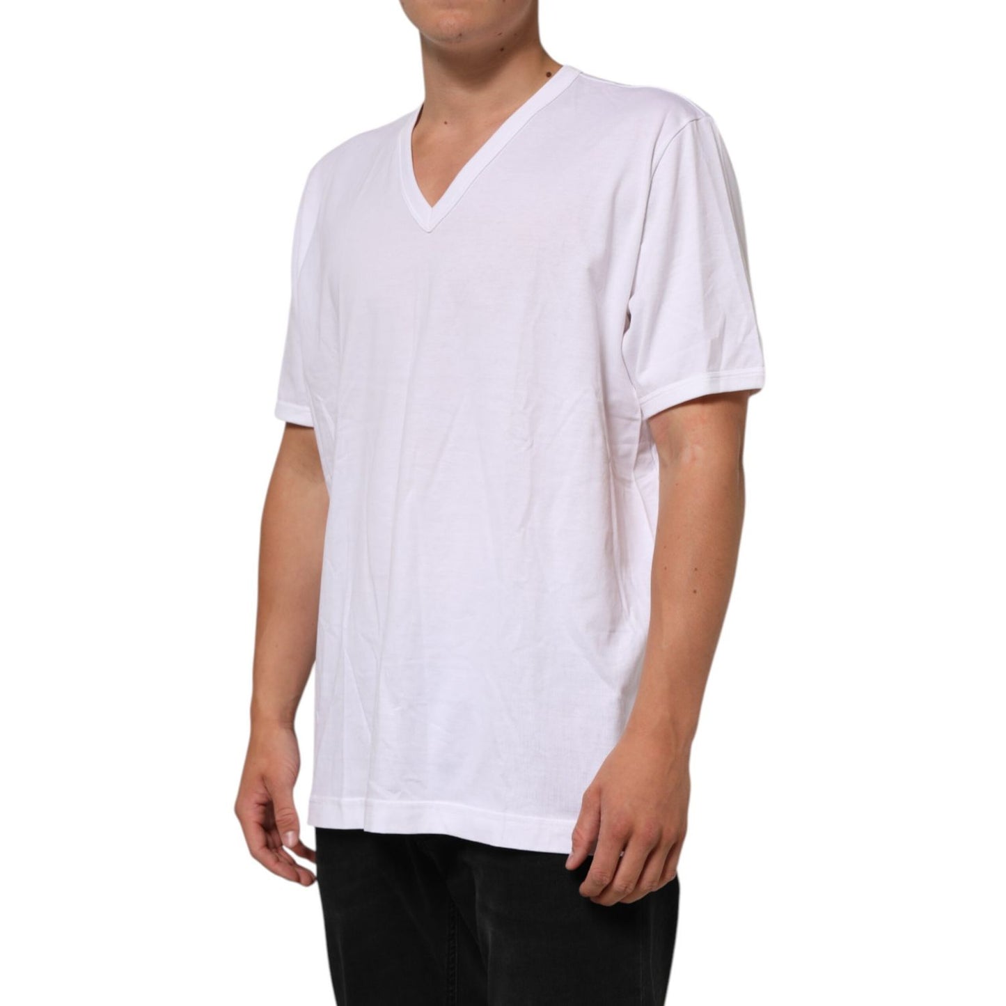 Dolce & Gabbana White Cotton V-Neck Short Sleeves T-shirt on model, showcasing classic design and breathable cotton comfort.