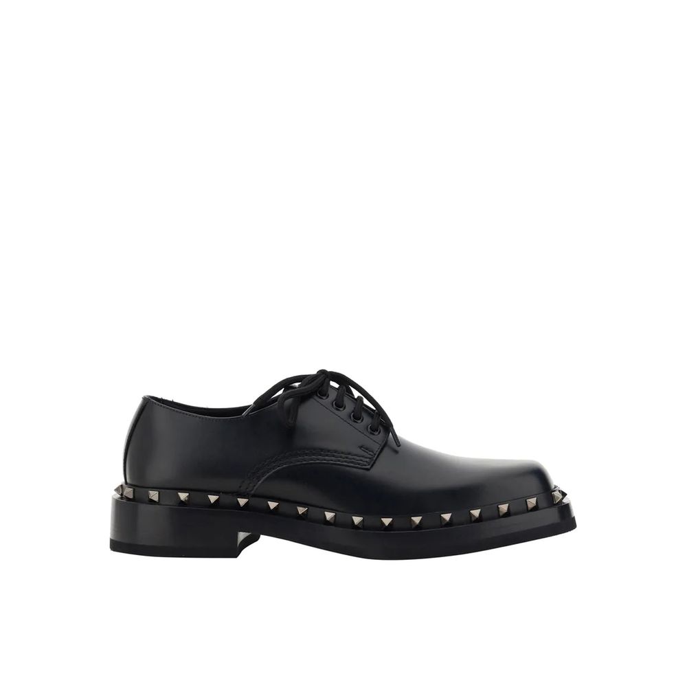 Valentino Garavani Black Calfskin Oxfords And Derbies with studs and lace-up closure.