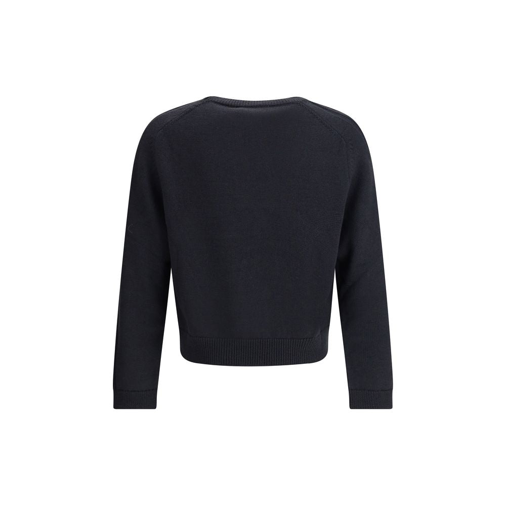 Back view of Our Legacy Blue Merino Wool Sweatshirt showcasing saddle sleeves and ribbed hem.