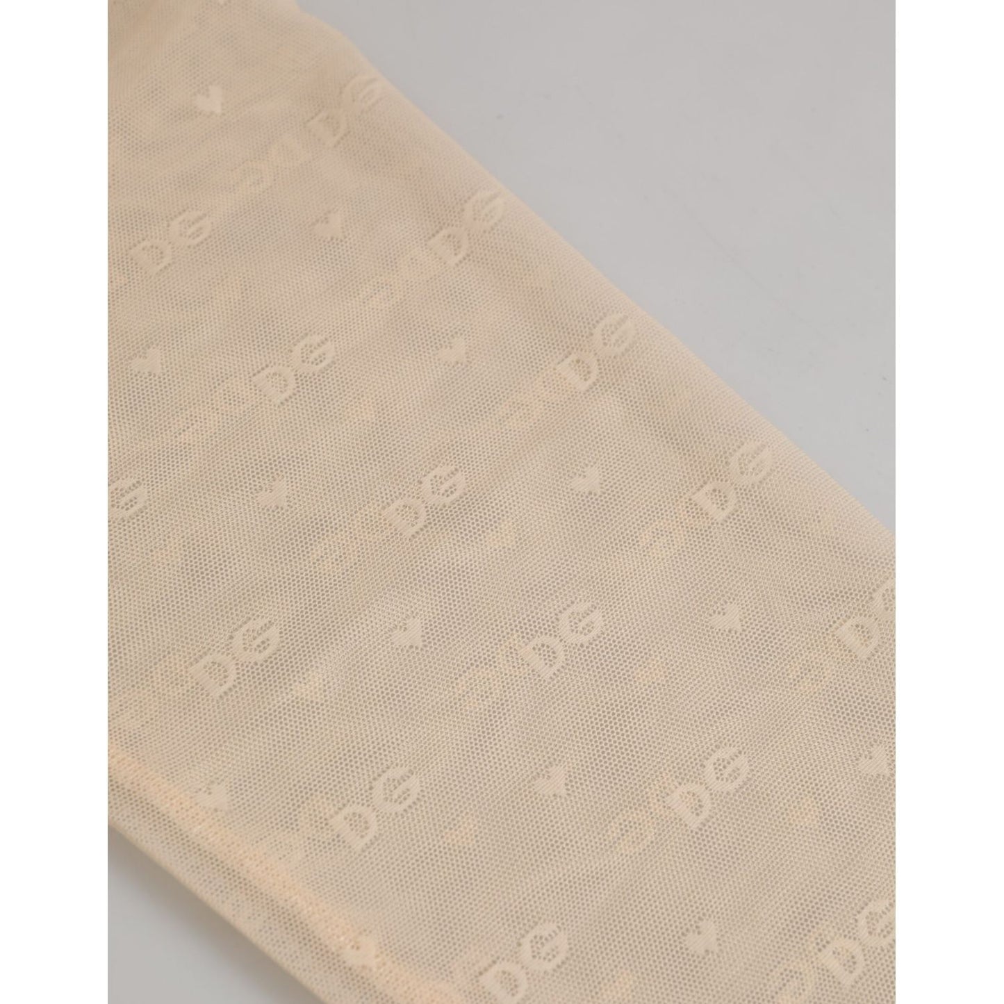 Dolce & Gabbana Beige Nylon Logo Lace Leggings Pants Underwear with DG logo waistband, showcasing intricate lace pattern in beige color.