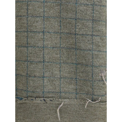 Close-up of grid pattern on Margiela Green Fleece Wool Sweatshirt, featuring detailed texture and design. Ideal for winter fashion.