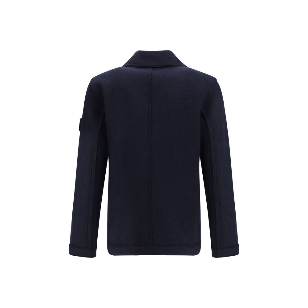 Back view of Stone Island Blue Fleece Wool Coat with distinctive badge on sleeve, showcasing its oversized fit and contemporary design.