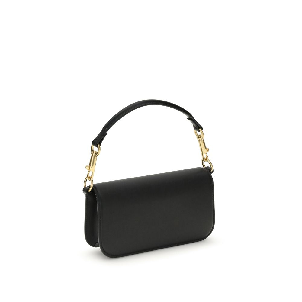 Valentino Garavani Black Calf Leather Bos Taurus Shoulder Bag with chain and top handle, featuring embossed VLogo and magnetic flap closure.