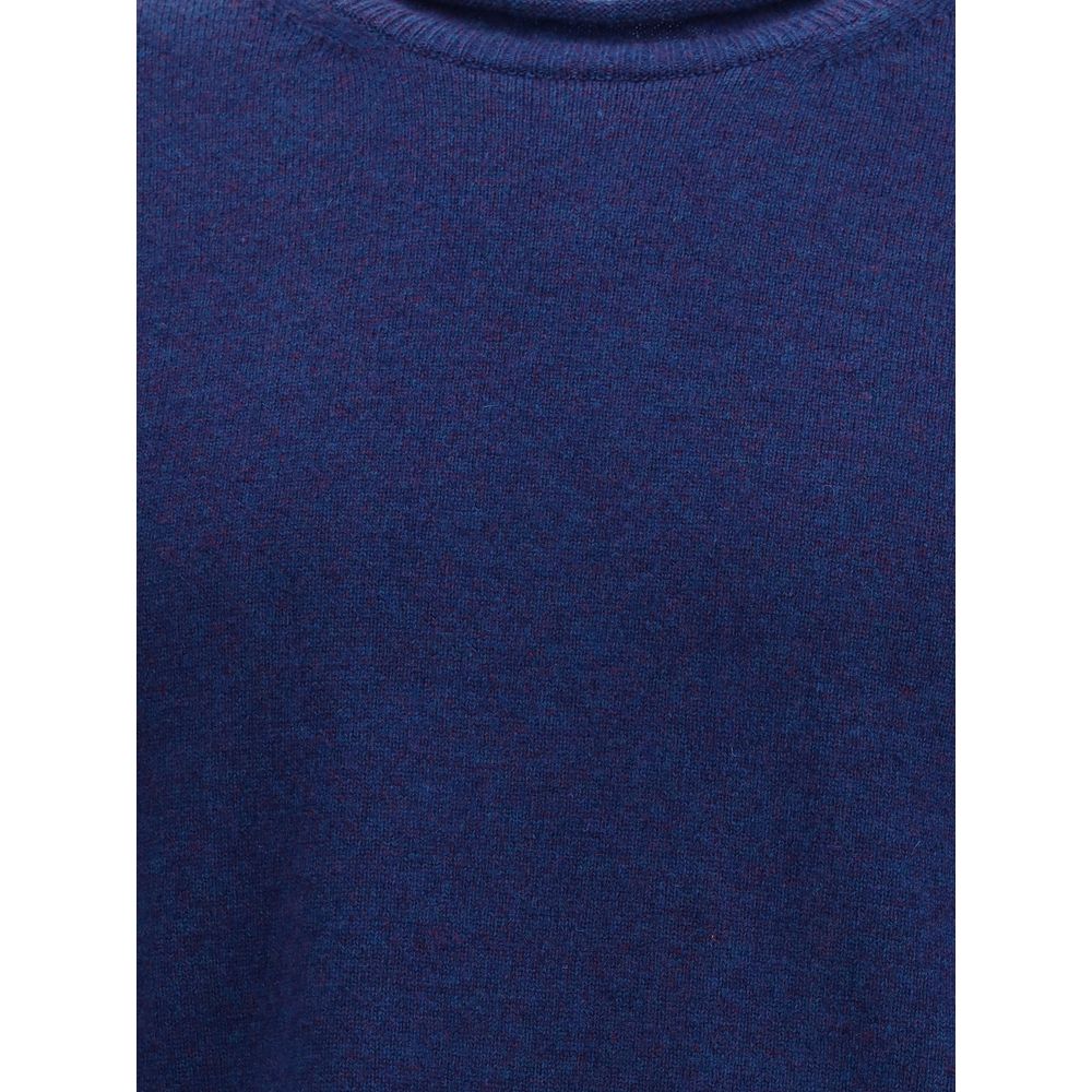 Comme Des Garçons Blue Wool Sweatshirt with ribbed knit texture, long sleeves, round neckline, ideal for elegant everyday wear, AW25 season.