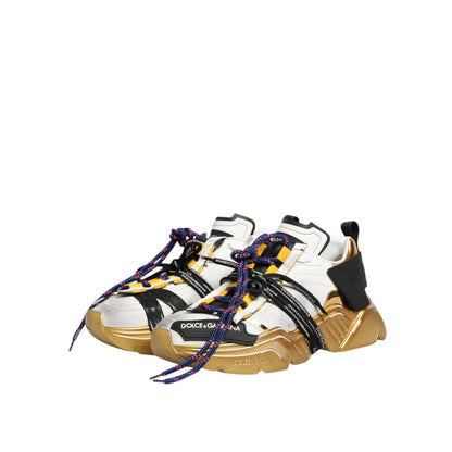 Dolce & Gabbana Multicolor Daymaster Low Top Sneakers Shoes with gold accents, crafted from white leather, featuring a chunky silhouette.