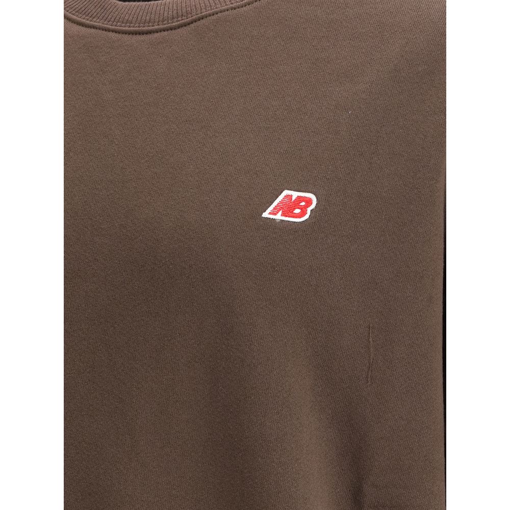 New Balance Brown Cotton Sweatshirt with logo, featuring minimalist design, crew neckline, and ribbed details for casual wear.