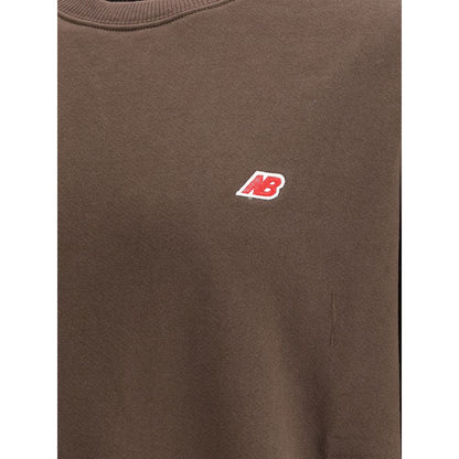 New Balance Brown Cotton Sweatshirt with logo, featuring minimalist design, crew neckline, and ribbed details for casual wear.