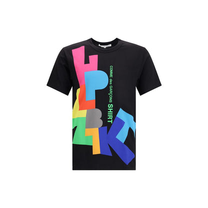 Comme Des Garçons Black Cotton T-Shirt with colorful graphic print on the front, short sleeves, and round neckline, made of 100% cotton.