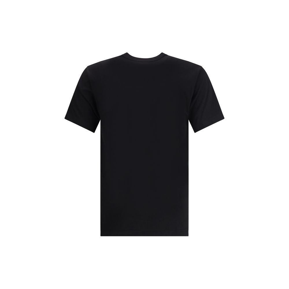 Comme Des Garçons Black Cotton T-Shirt, minimalist design, short sleeves, round neckline, versatile for casual and elegant looks.