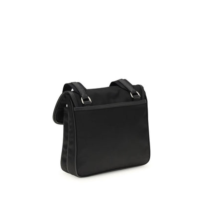 Back view of Prada Black Recycled Polyamide Shoulder Bag with adjustable strap and sleek design.