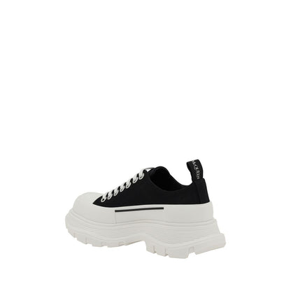 Alexander McQueen Black Rubber Chunky Sneakers with reinforced toe and contrasting platform sole.