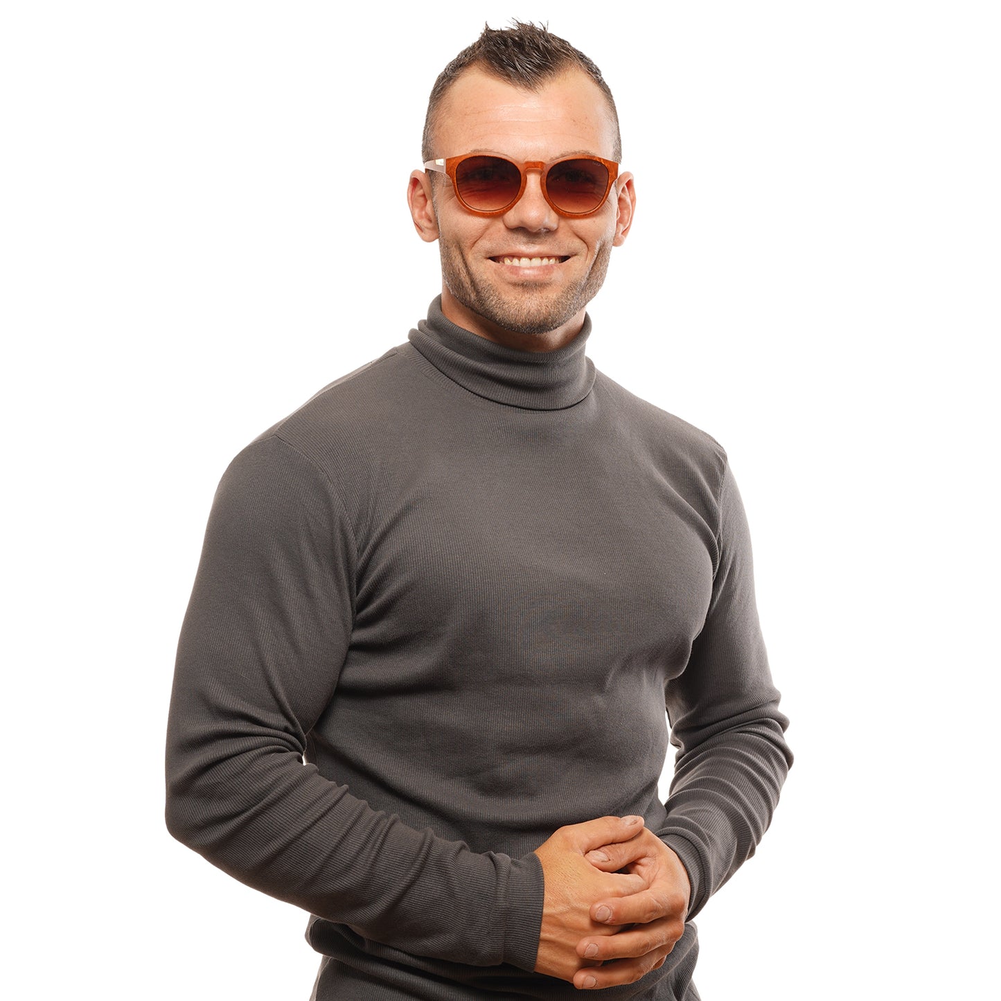 Unisex model wearing BOLLE MOD. 12598 ROOKE 54 sunglasses, showcasing stylish design and comfortable fit.