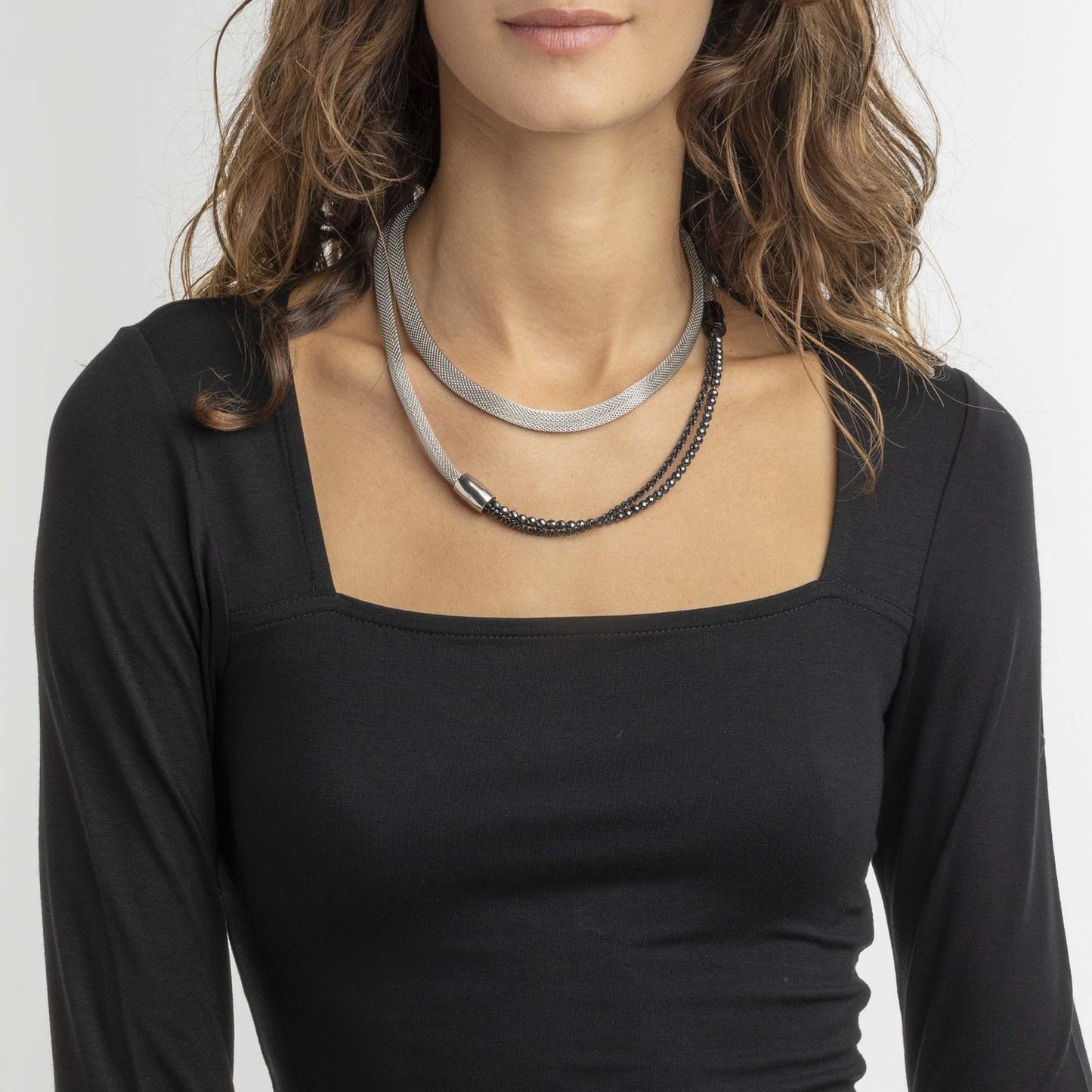 Lady wearing BREIL JEWELS Mod. TJ2938 bracelet, showcasing elegant design and style, packaged in official box.