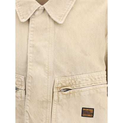 Balenciaga Beige Cotton Denim Jacket with classic collar and zipper front, featuring zippered patch pockets and mini logo patch.