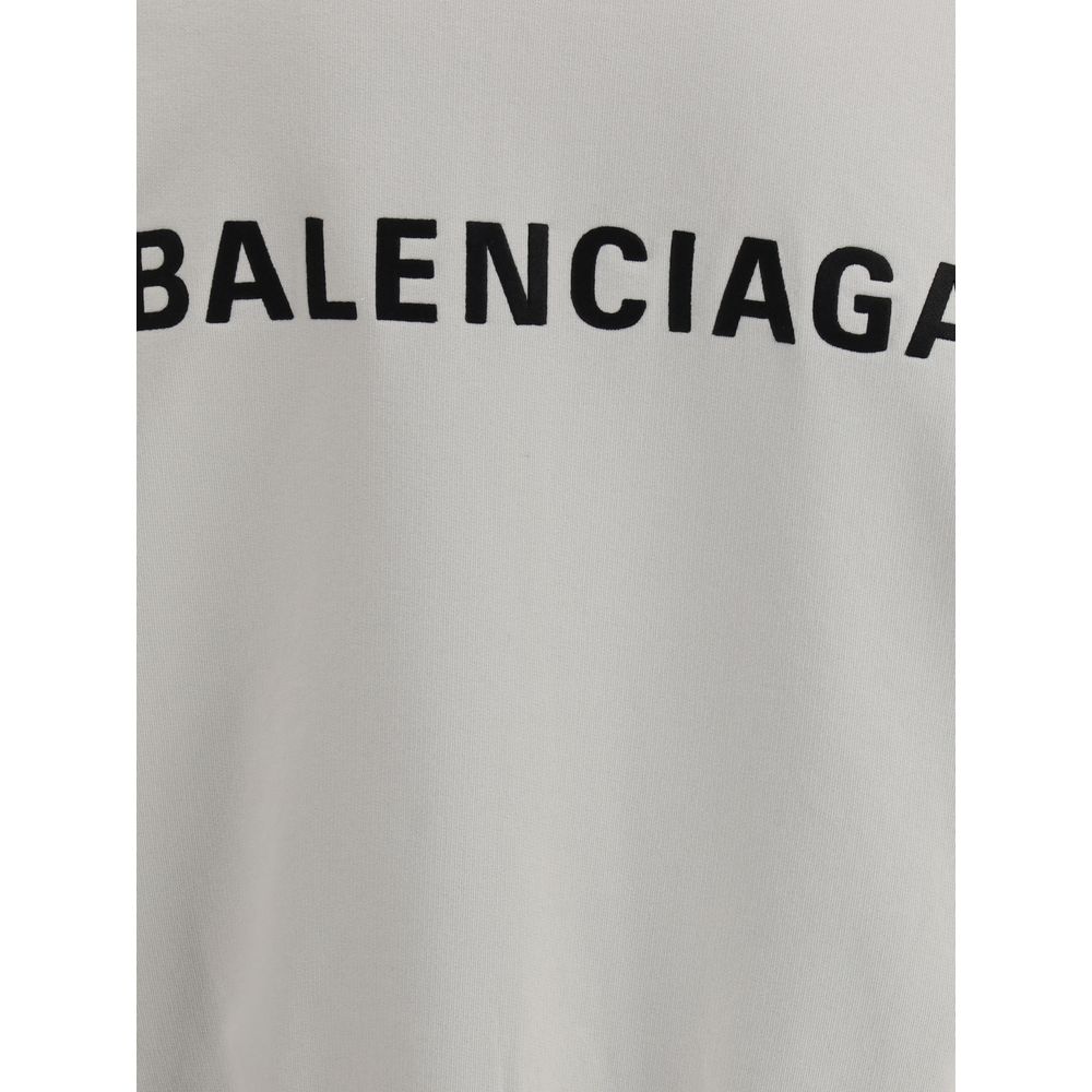 Balenciaga White Cotton Sweatshirt with logo and worn effect, featuring patch pockets and detailed hem and cuffs.
