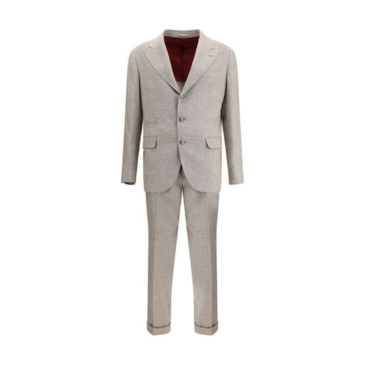 Brunello Cucinelli Beige Silk Two-Piece Suit with peaked lapels and tailored pants, showcasing timeless elegance and high-quality craftsmanship.