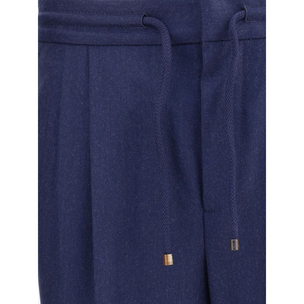 Close-up of Brunello Cucinelli Blue Fleece Wool Casual Pants with drawstring waistband and mélange pattern.