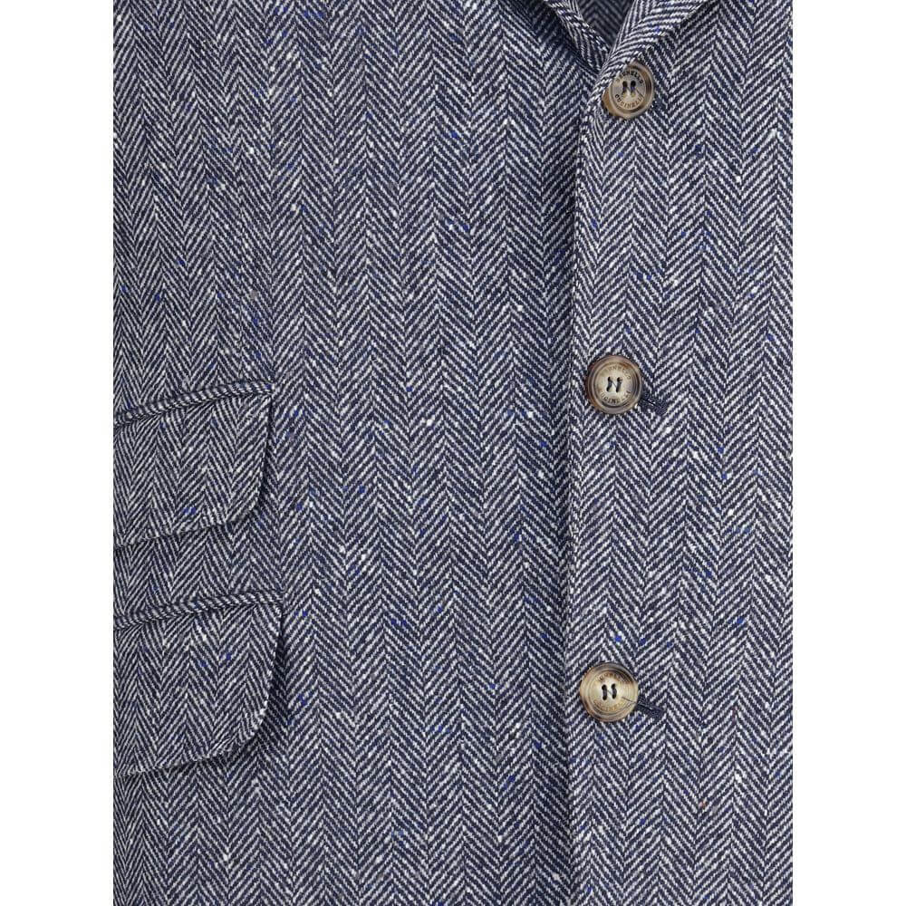 Close-up of Brunello Cucinelli Blue Wool Blazer with herringbone pattern and classic button detailing.