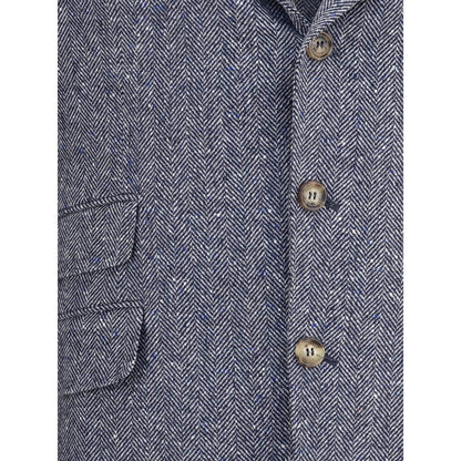 Close-up of Brunello Cucinelli Blue Wool Blazer with herringbone pattern and classic button detailing.