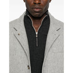 Brunello Cucinelli Cashmere sweater in grey with half zip front, long sleeves, and ribbed cuffs and hem, featuring a high-neck design.