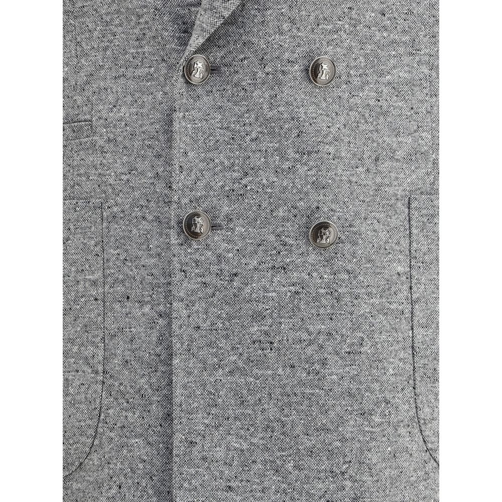 Detail of Brunello Cucinelli Gray Wool Two-Piece Suit with button closure and patch pockets.