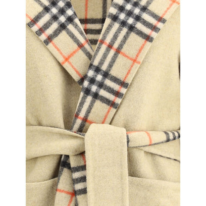 Close-up of Burberry Beige Wool Coat showing reversible plaid pattern and belt.