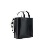 Calfskin Museo Handbag by Marni with monogram, black leather, flat handles, adjustable shoulder strap, interior pocket, calf leather.
