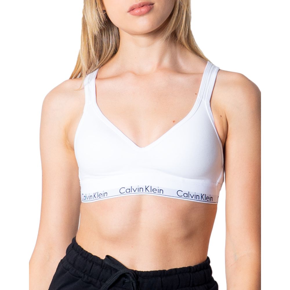 Calvin Klein Underwear White Polyester Bra worn by model, showcasing elegant design with logo band for comfortable everyday wear.