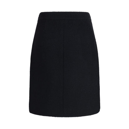 Chloé Black Wool Midi Skirt with front flap pockets and gold-tone buttons, crafted from premium bouclé wool for AW25 Season.