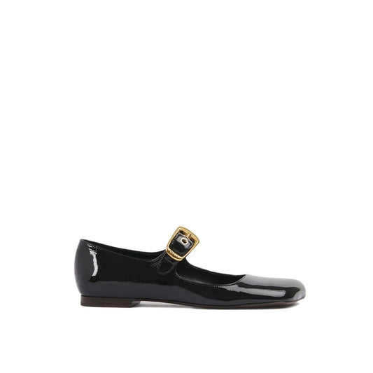 Chloé Chloè Mary-Jane Polly Ballerina Flats in patent leather with oversized gold buckle and asymmetrical toe design, side view.