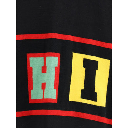 Colorful lettering on the Comme Des Garçons Black Marabou Sweatshirt, showcasing contemporary design and bold accents.