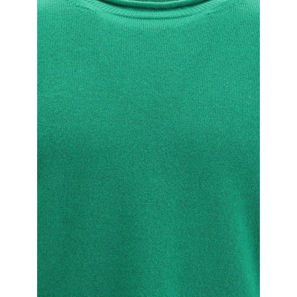 Comme Des Garçons Green Wool Sweatshirt with ribbed knit texture, round neckline, ideal for everyday elegance. Perfect for AW25 season.