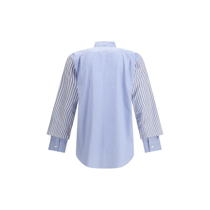 Back view of Comme Des Garçons Light Blue Cotton Pattern Shirt with striped sleeves and double cuffs, showcasing modern elegance.