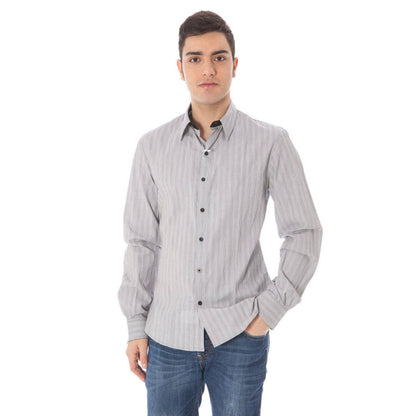 Man wearing Costume National White Cotton Men Shirt with Italian design and concealed placket.
