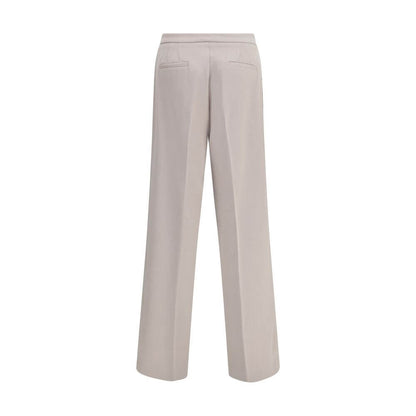 Back view of Cruna Beige Polyester Casual Pants with wide leg design, featuring two welt pockets and a clean, versatile silhouette.