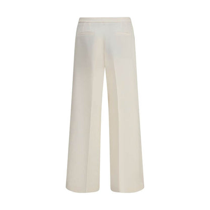 Cruna Cream Polyester Casual Pants with wide leg, front zip, and button fastening, designed for versatile looks.