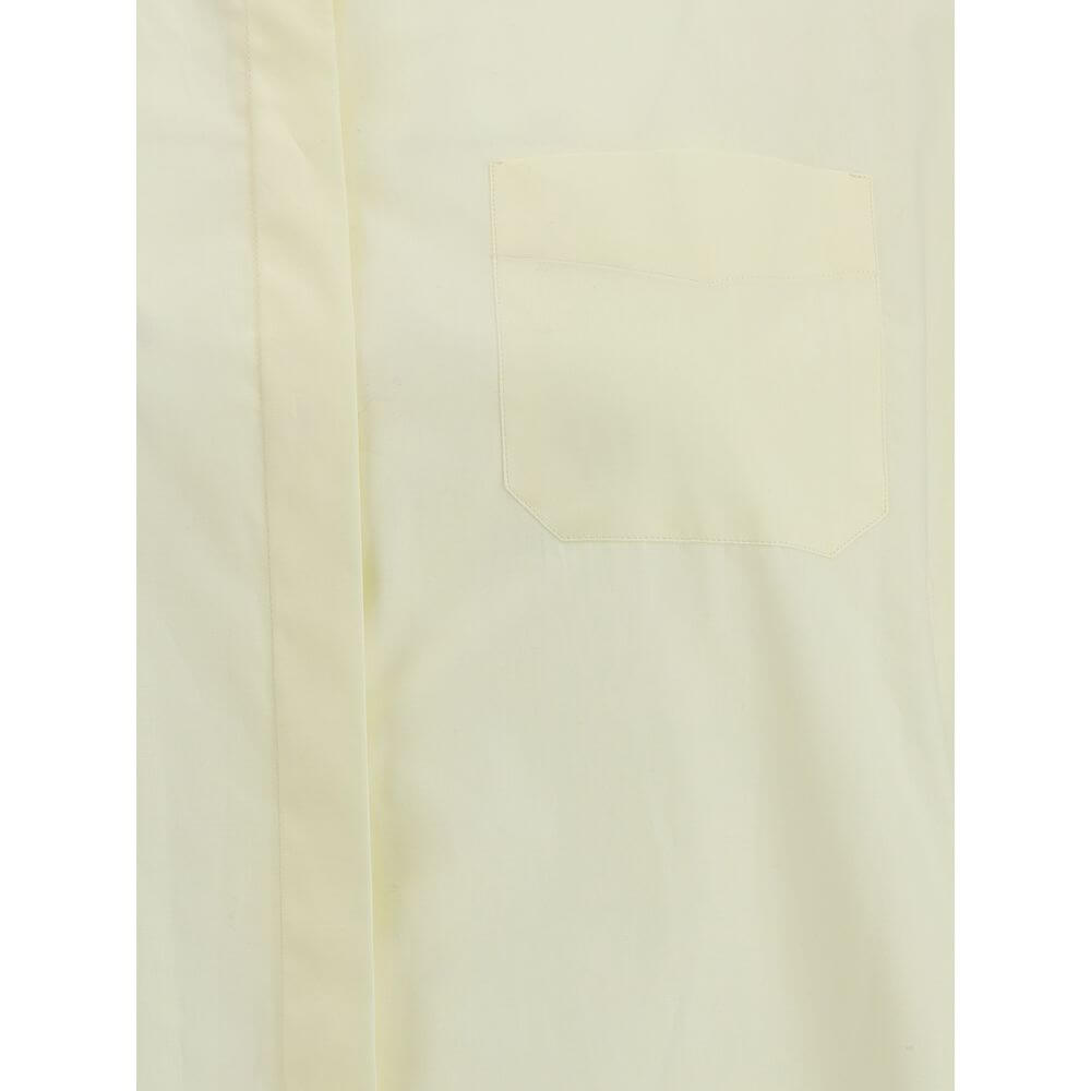 Detail view of Cruna Yellow Cotton Blouse showcasing the elegant design with a classic collar and hidden button front.