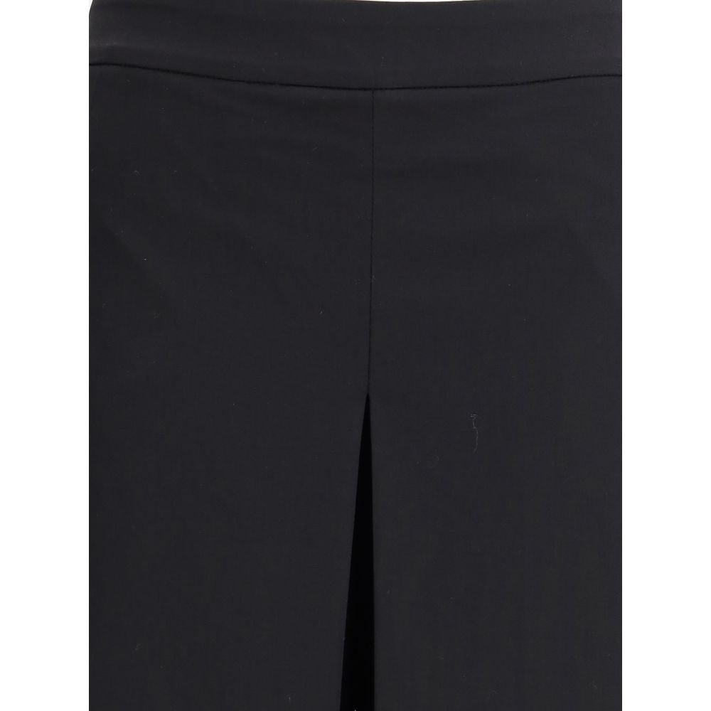 Di Stavnitser Black Polyester Casual Pants with wide leg and high waist design showing sleek silhouette.
