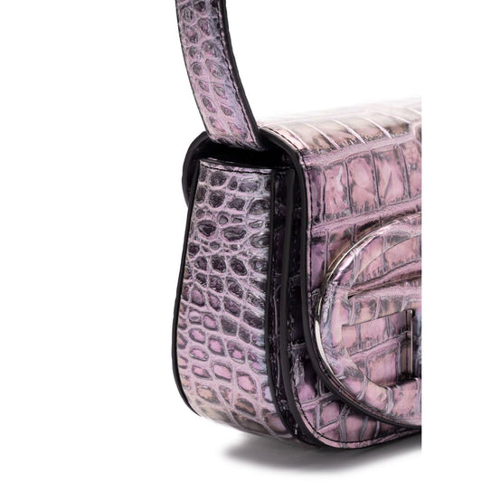 Close-up of Diesel 1DR Tote Bag in crocodile-embossed pink leather, showing side detail of handle and embossed texture.
