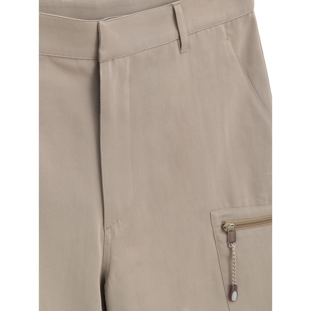 Close-up of Dior Beige Cotton Cargo Shorts with zipper pocket detail, made of 55% cotton and 45% polyester.