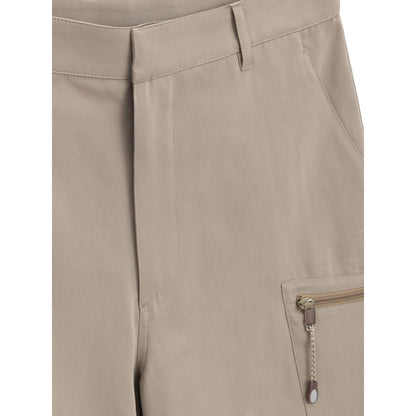 Close-up of Dior Beige Cotton Cargo Shorts with zipper pocket detail, made of 55% cotton and 45% polyester.
