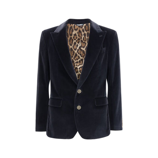 Dolce & Gabbana Black Cotton Blazer with velvet finish, rounded peak lapels, button closure, and animal print lining, ideal for formal occasions.